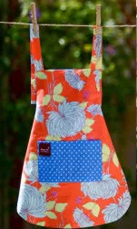 Children's aprons as pretty as the clothes underneath