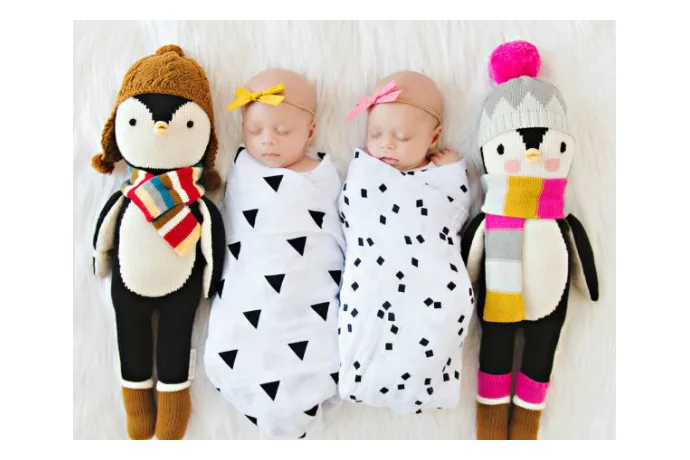Go holiday shopping for a new mom in your life while supporting a great cause too, with one of these amazing gifts, like these handcrafted dolls from Cuddle & Kind.