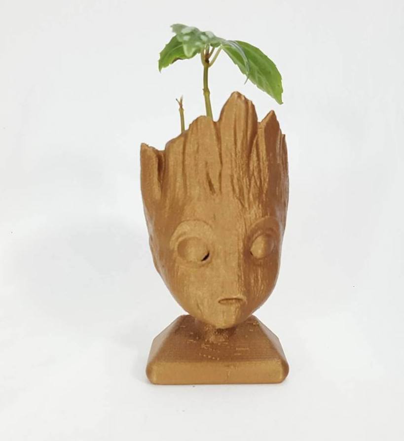 Cool kids' stocking stuffer ideas: 3D printed Baby Groot inspired planter or pencil holder