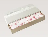 A baby wrap so pretty you might steal it for yourself