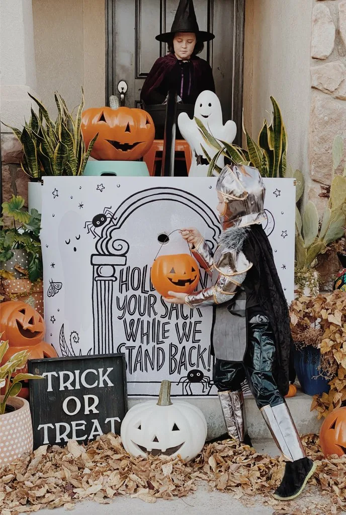 Halloween cake via delish: Host your own Halloween "Nailed It" competition as a trick or treat alternative