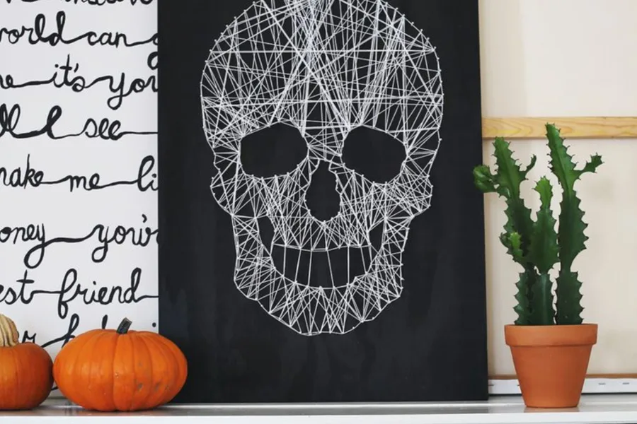 Cool ideas for tween and teen Halloween crafts: skull string art from A Beautiful Mess