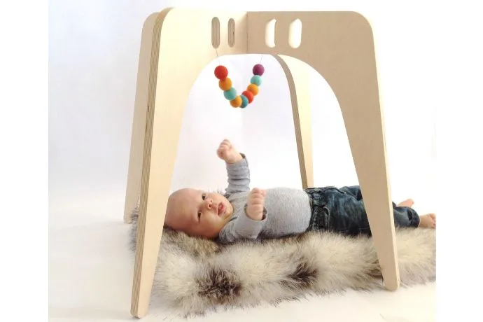 Nin and June baby play gym on Etsy
