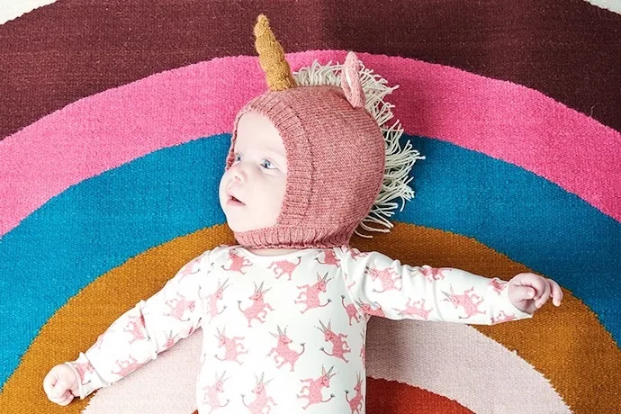 This hand knit 100% alpaca baby unicorn hat from Oeuf is 100% awesome.
