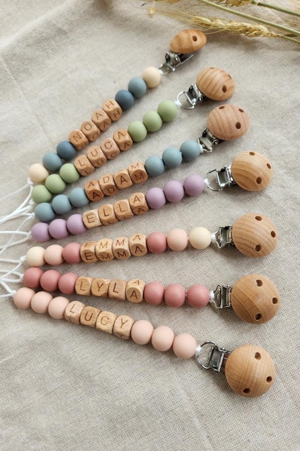 Personalized baby gifts: Handmade wooden beaded pacifier holder by Little Coco Gifts