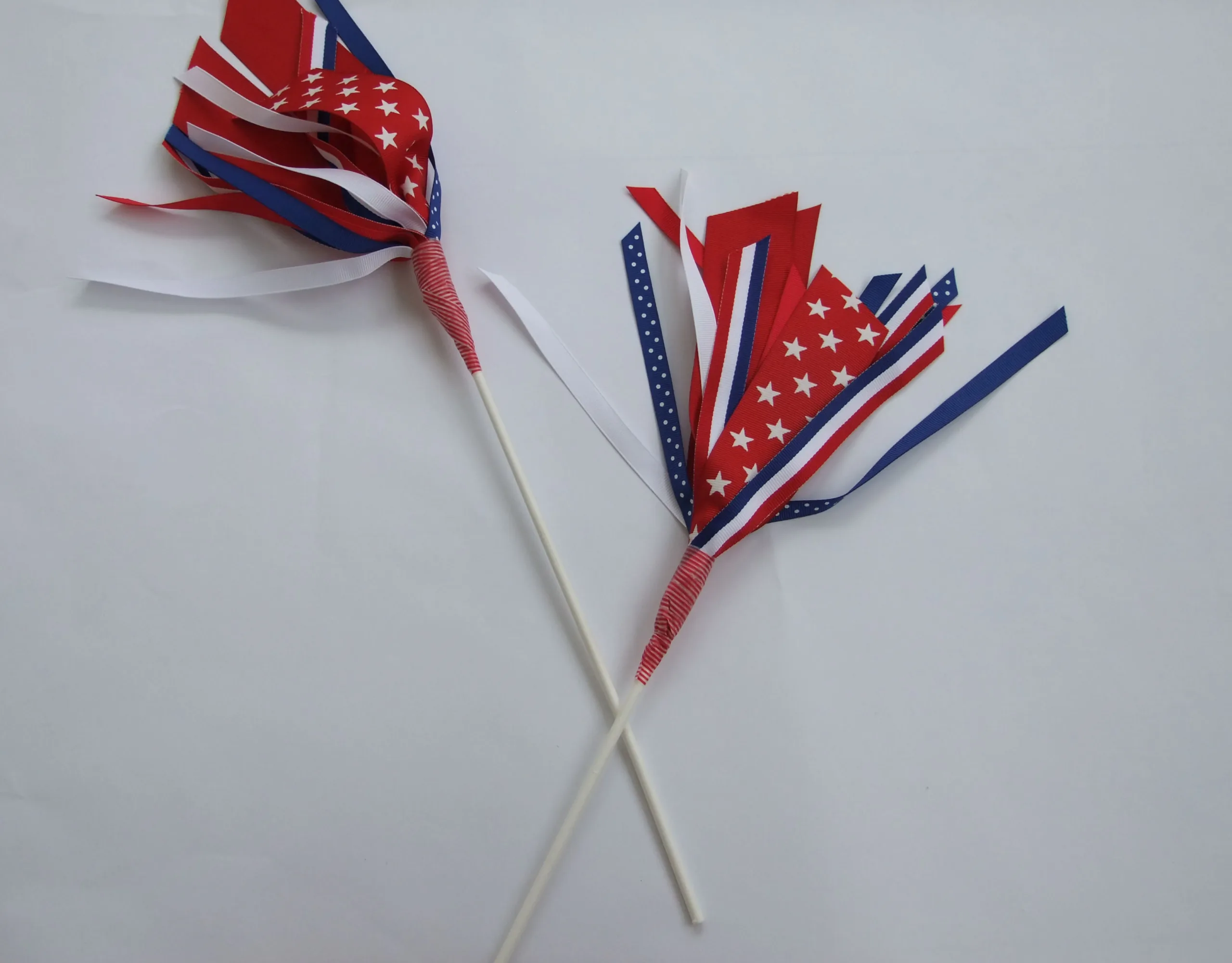 red, white, and blue ribbon wand