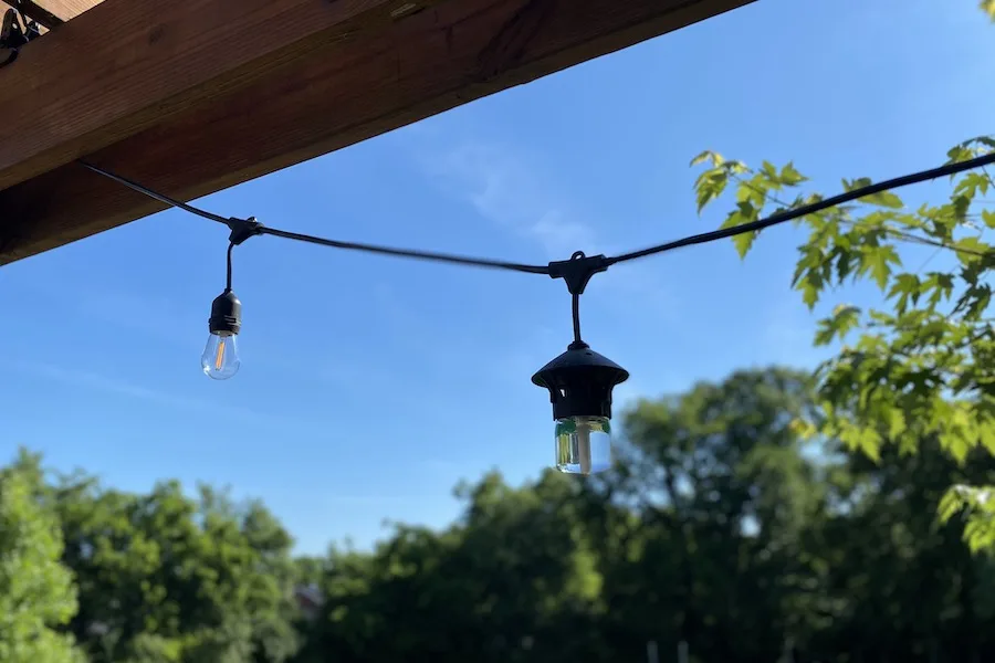 The only string lights you need this summer: Tiki BiteFighter porch lights fight mosquitos too.