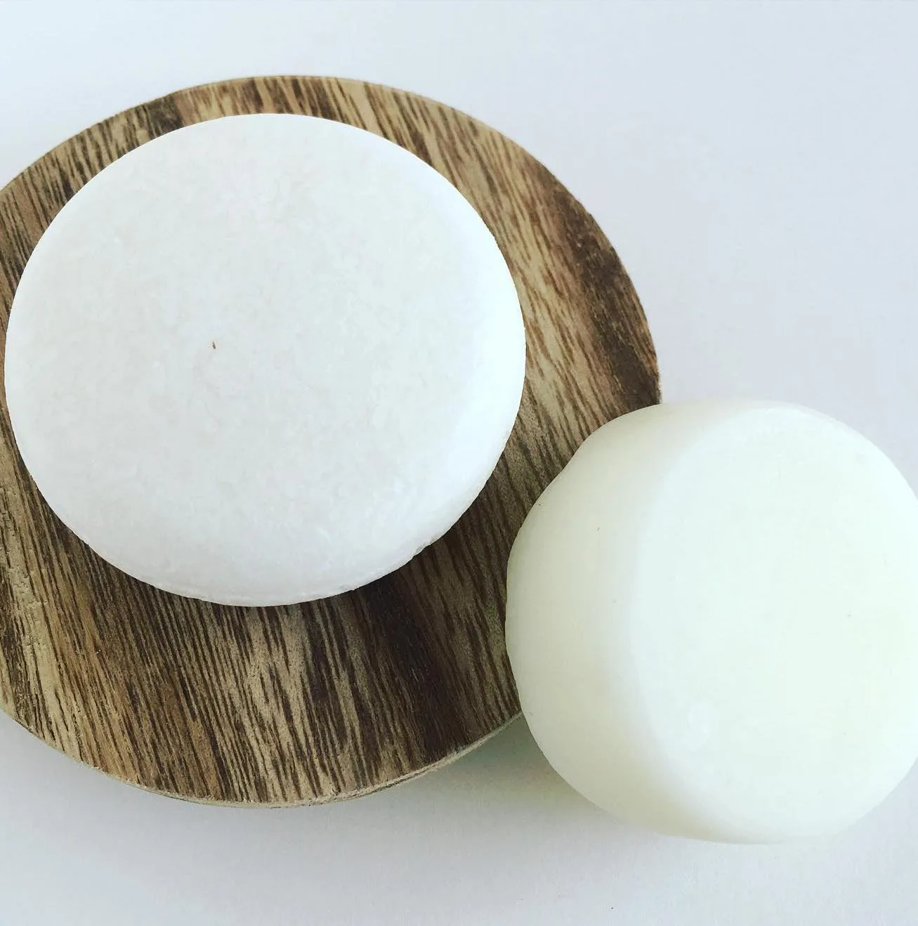 Our honest review of Green Ablutions Bar Shampoo: A bar shampoo and conditioner save space, water, packaging, and more.