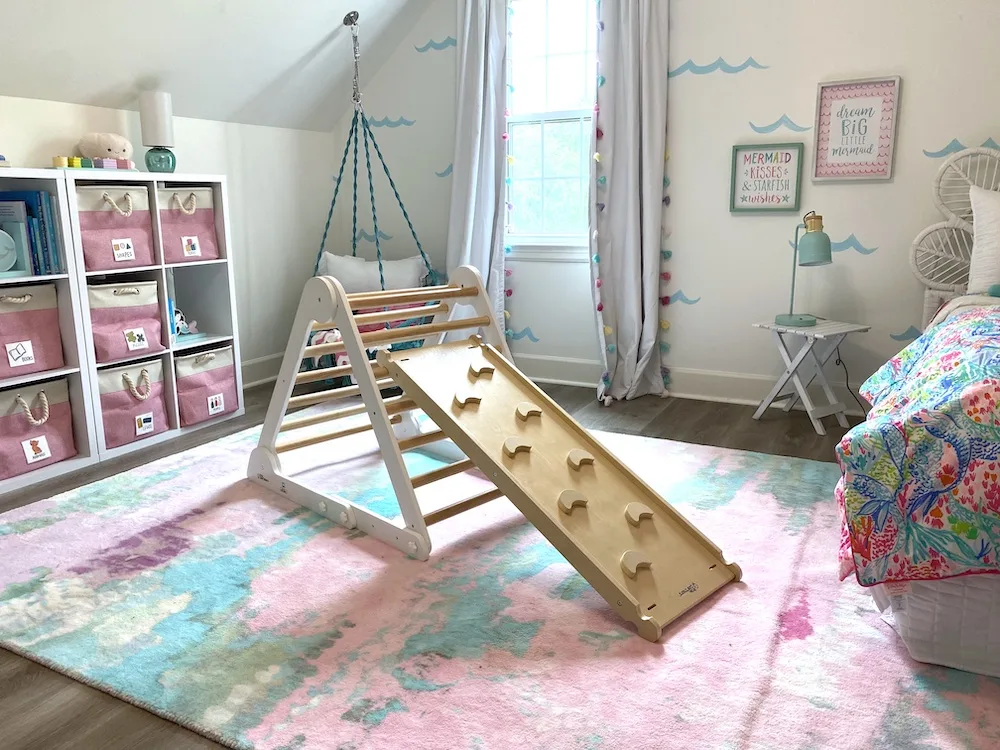 The Little Partners play gym is great for PT sessions in this room makeover for adopted kids by Bloom Family Designs.