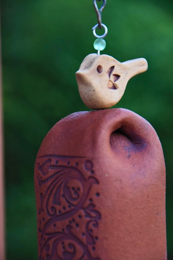 handmade, terra cotta colored ceramic wind chime
