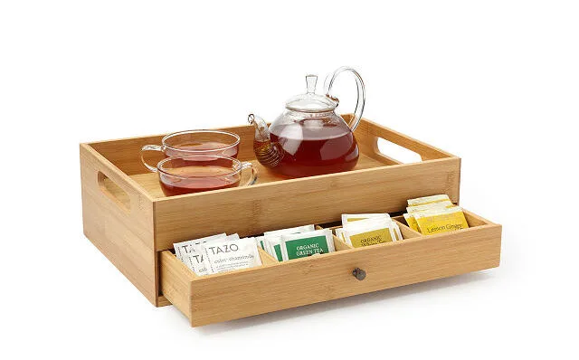 Gifts for The Crown fans: A lovely tea tray and storage set, from Uncommon Goods. Filled with their favorite British teas, of course.