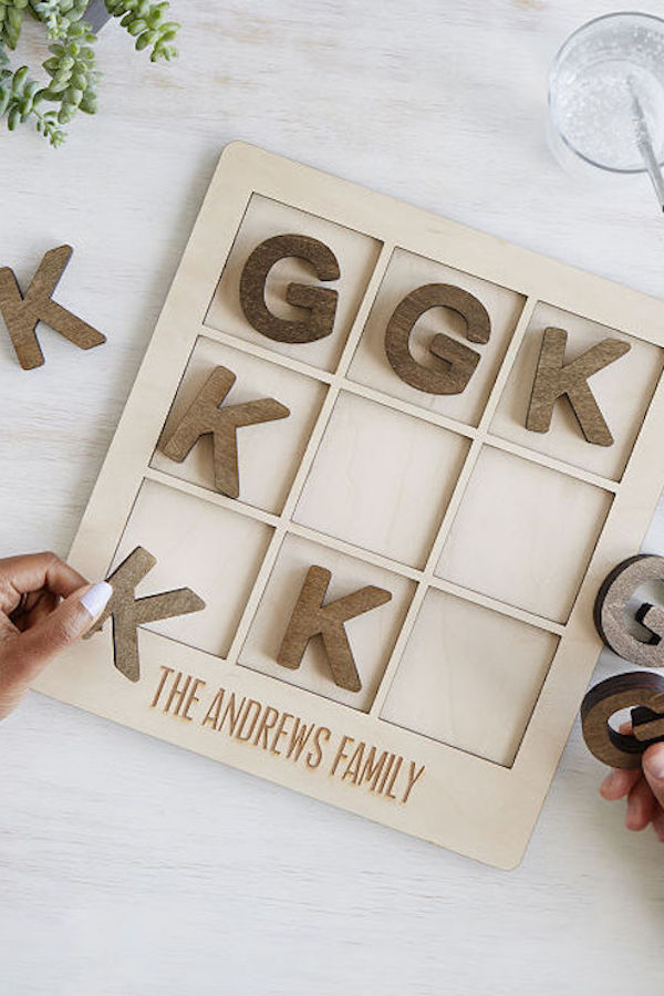 Order this personalized Tic Tac Toe board from Uncommon Goods and receive by the holidays.