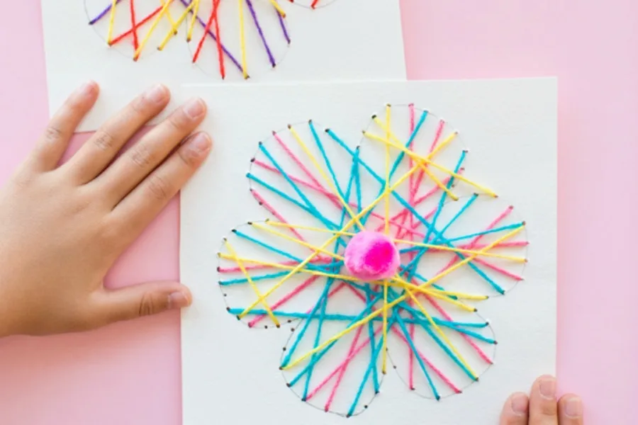 Flower crafts for kids: String Art Flower by Hello, Wonderful