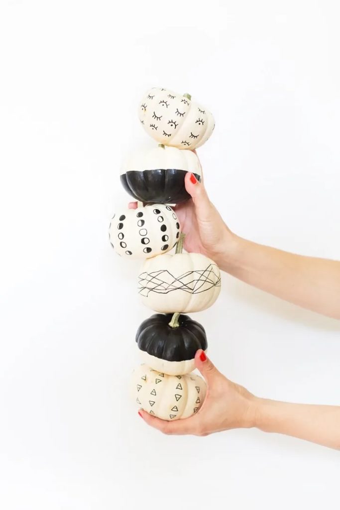 No-carve pumpkins for Halloween: DIY Paint Pen Pattern No-Carve Pumpkins | Lovely Indeed