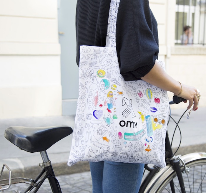 Color-your-own bags and accessories for kids from OMY include a backpack and this tote. Fun!