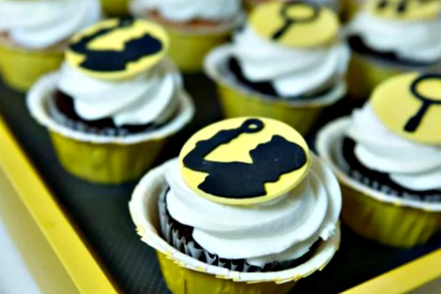 Over 25 ideas to throw an exciting Escape Room party at home: Love these detective-style fondant toppers from Edible Details.