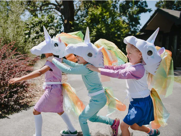 DIY Unicorn costume kit from Kiwi Co includes STEM components to help teach kids about phosphorescence and illumination in the glow-in-the-dark horn!