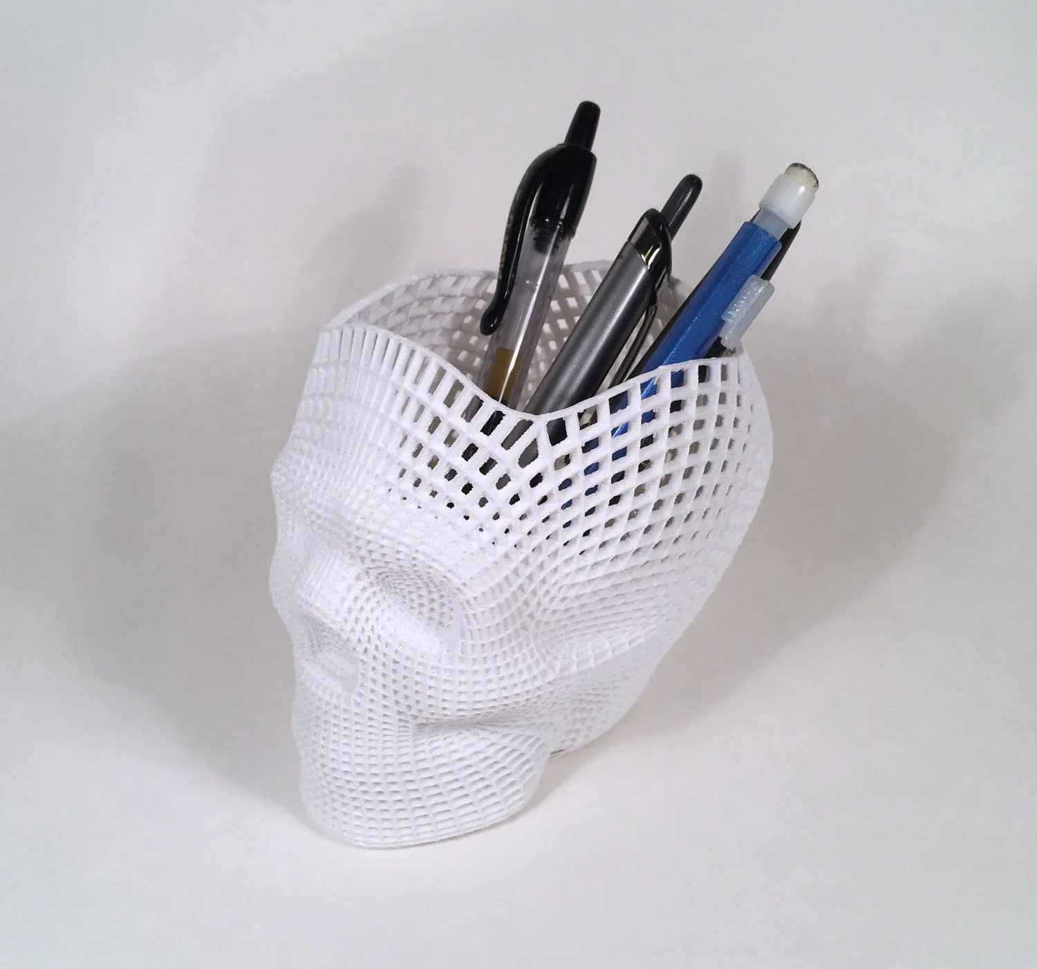 3D printed skull pencil holder on Etsy