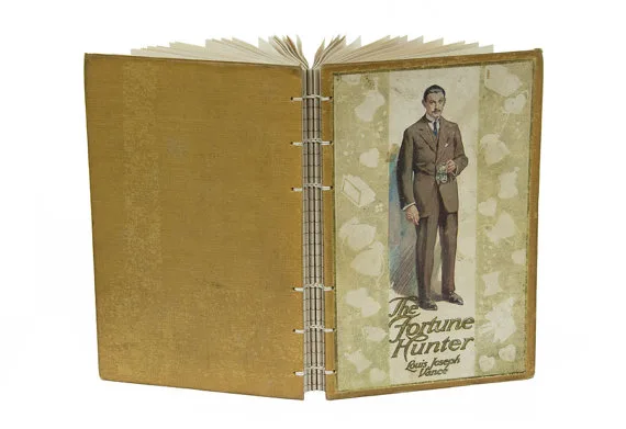 The Fortune Hunter recycled book journal on Etsy