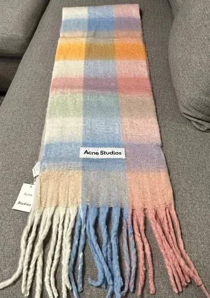 Acne Studios scarves for less: This one on poshmark is NWT and at a huge discount!