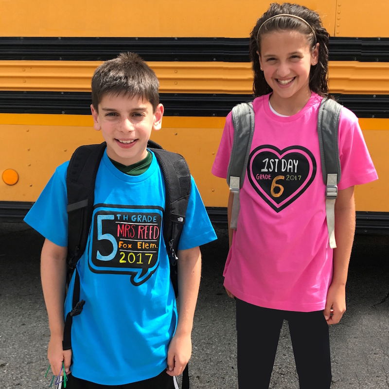 Creative first day of school photo ideas: Chalk of the Town chalkboard tees turn your kids into their own signs! 