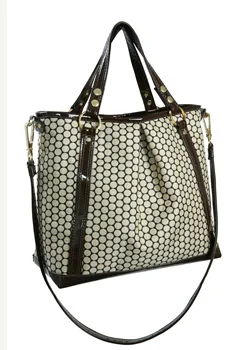 The newest designer diaper bag that you'll be carrying long after the diapers are gone