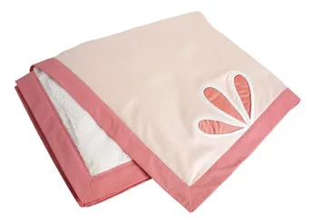 Serena & Lily supports breast cancer month with a blanket you'd totally buy anyway