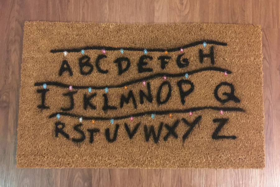 We're loving this creepily festive Stranger Things doormat from Etsy shop Ry Nic products.
