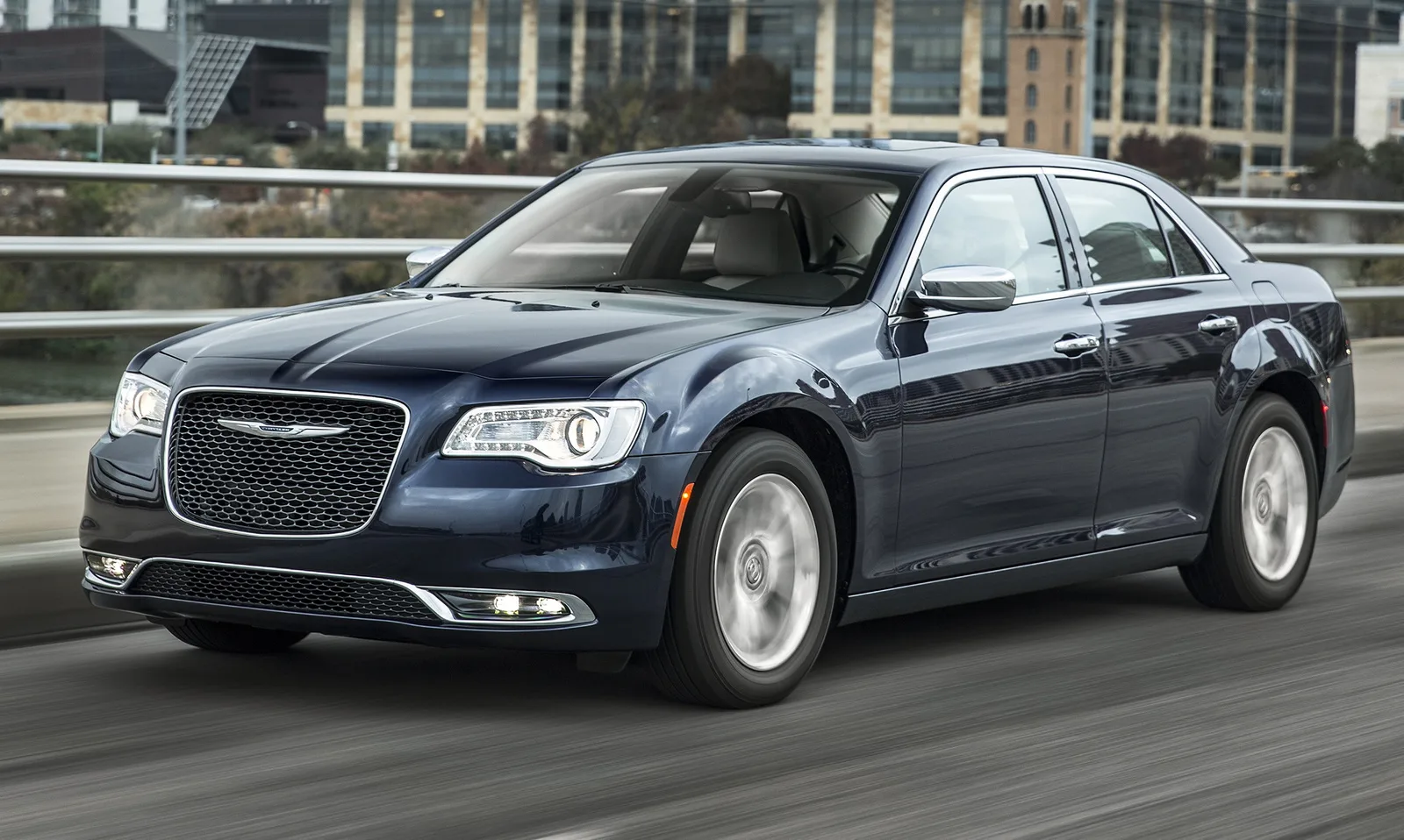 Cars for big families: The Chrysler 300 safely accommodates 3 child seats together in the second row