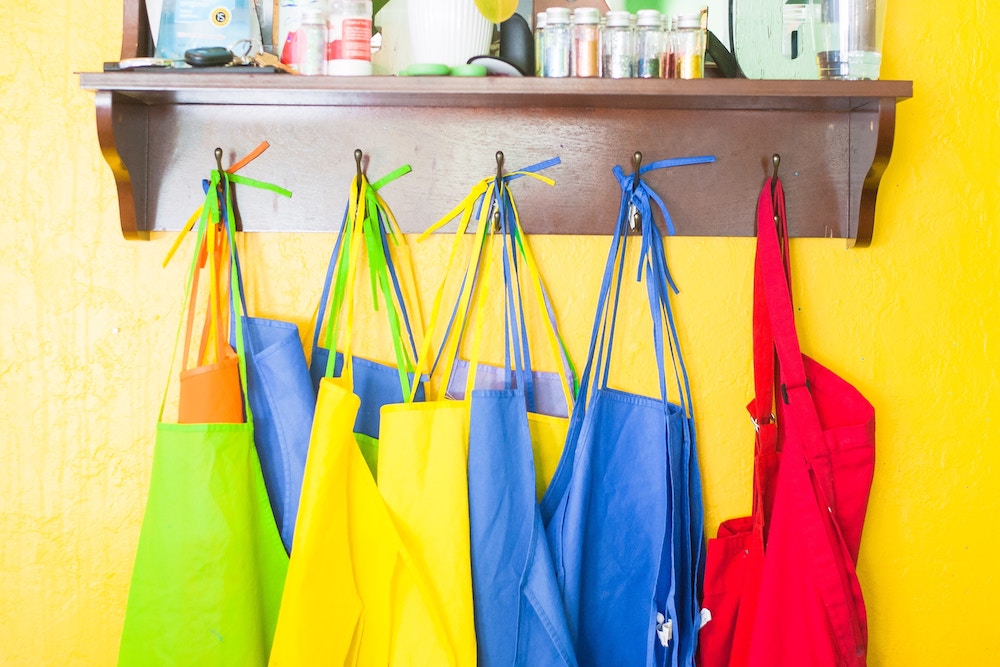 Slime party tip: Have aprons for the kids, or turn the aprons into the party invitations!