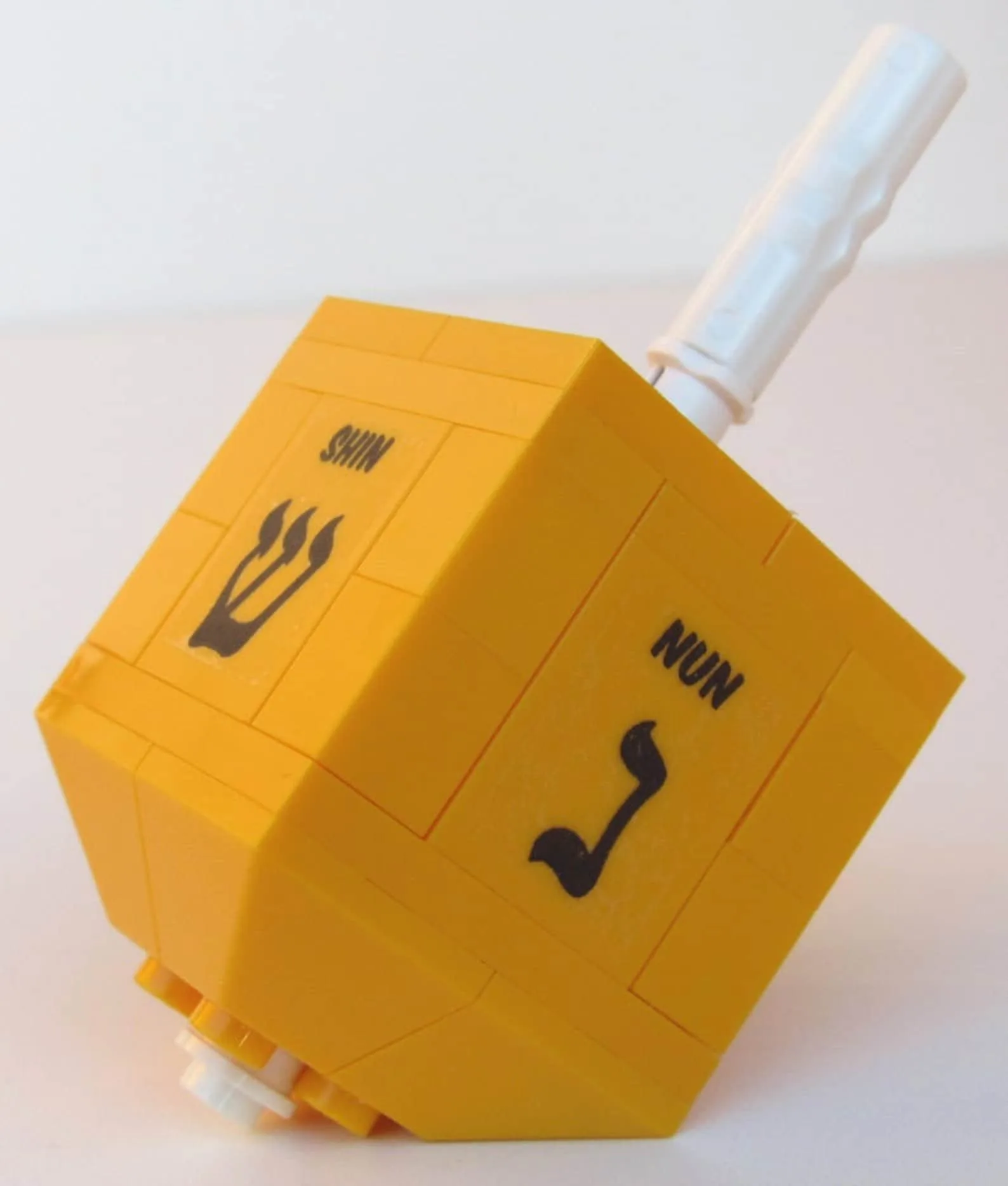 LEGO dreidel from Eagle Bricks on Etsy in your choice of colors
