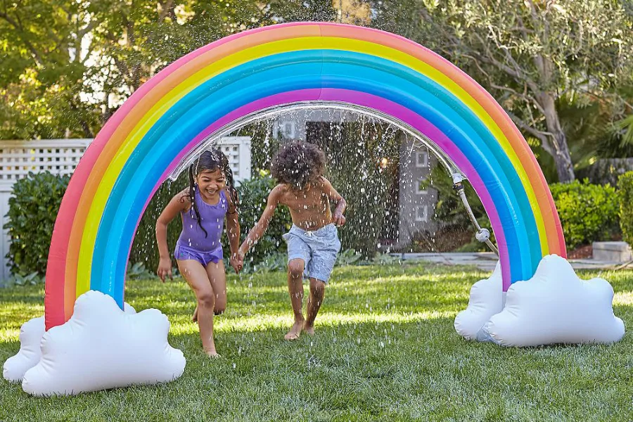 These amazing giant inflatable sprinklers are making us wish it were summer even more!
