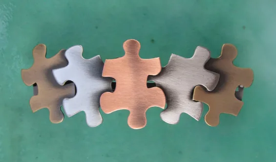 A puzzle piece barrette that just fits for World Autism Awareness Day