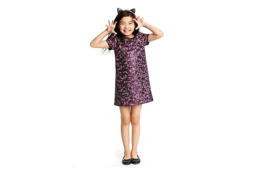 The best sparkly holiday dresses for kids, like this adorable Mulberry shift dress at Gap.