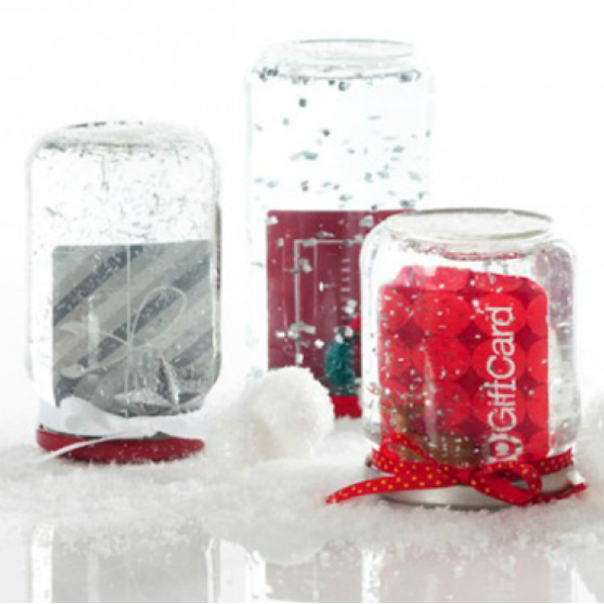 How to make gift cards more special: Create a DIY gift card snowglobe like this one from Smarty Had A Party!