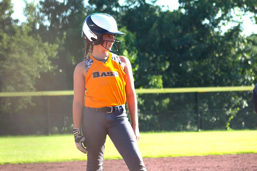 What happened when an umpire asked this deaf girl to remove her hearing devices during a softball game
