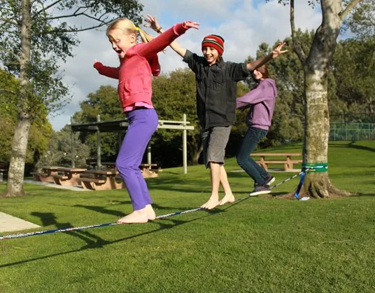 Tiptoe over the tulips while slacklining.