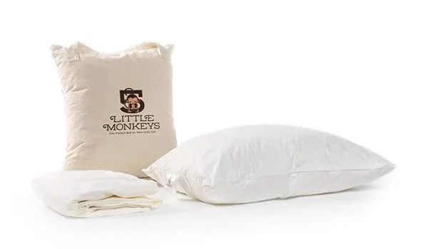 5 Little Monkeys kids' organic mattress-in-a-box comes with a pillow and mattress cover, too!