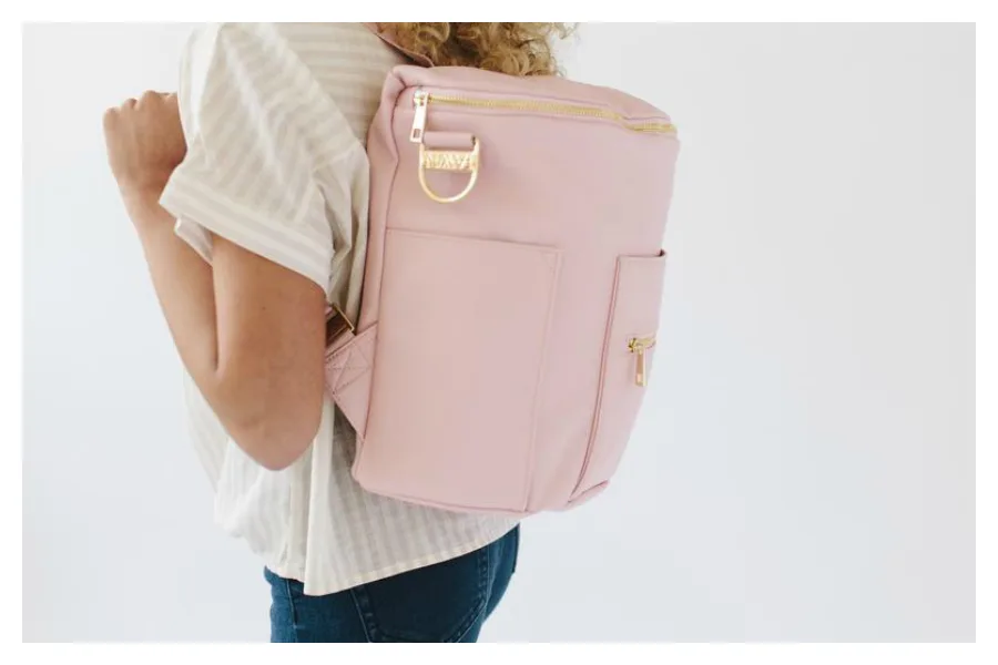 These stylish summer diaper bags will freshen up any look. We love this Blush Diaper Bag from Fawn Designs.