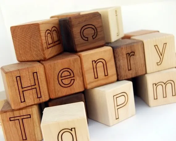 Personalized alphabet blocks help you spell BEST BABY GIFT EVER