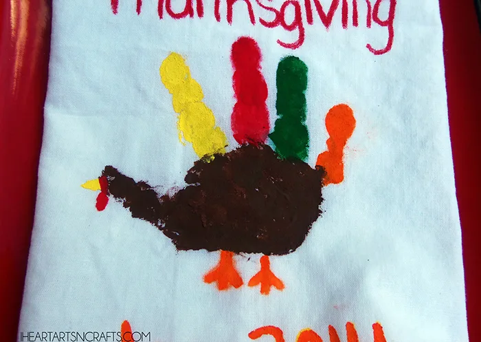 Thanksgiving Turnkey Handprint Napkin Craft idea via I Heart Arts n Crafts