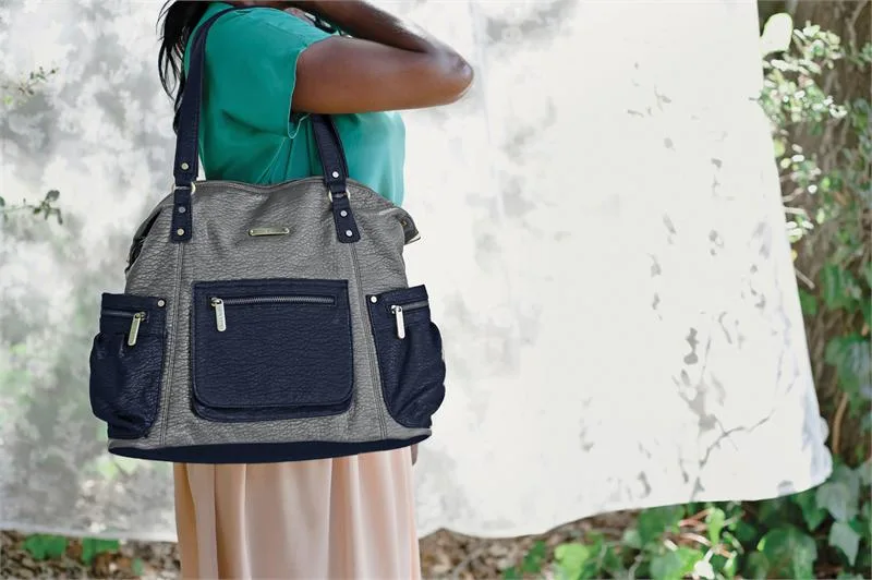 The new designer diaper bags from Timi & Leslie hold a lot. Because heaven knows moms carry more than diapers with them.