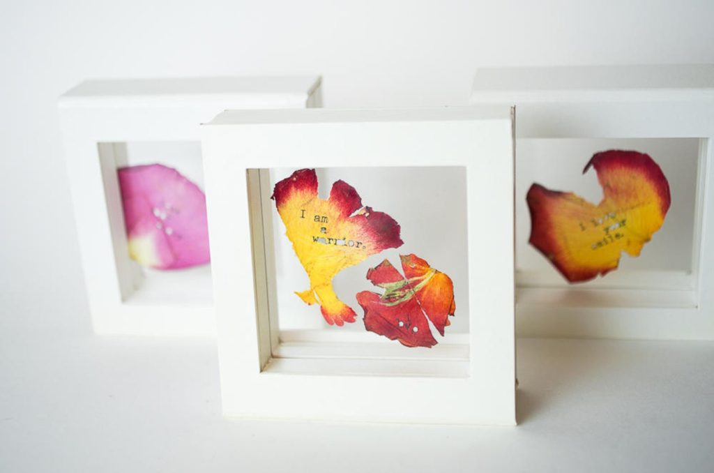 Meaningful Mother's Day gifts for mom or grandma: Personalized flower art with words on petals, suspended in this glass frame | Mother's Day Gift Guide