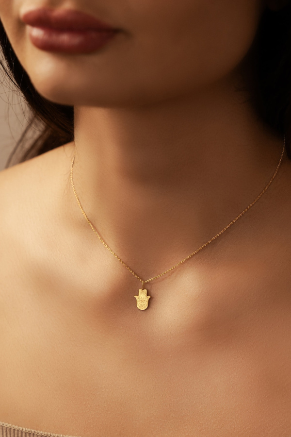 Symbolic keepsake jewelry gifts for grads: Hamsa mini pendant from Statodoro on Etsy