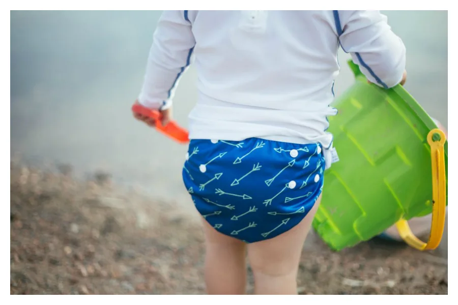Check out our round-up of the coolest reusable swim diapers for boys!
