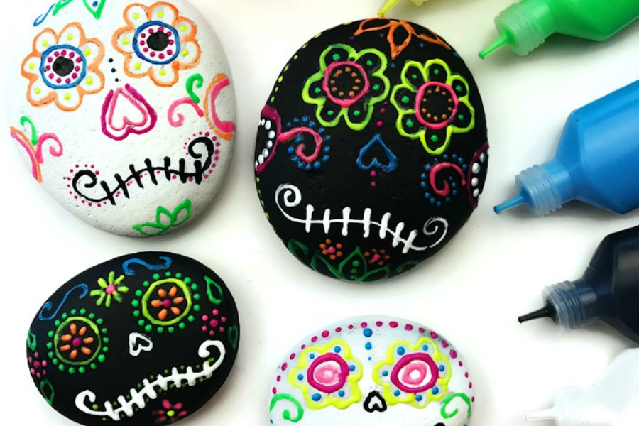 12 spectacular sugar skull craft ideas for Día de los Muertos, from painted planters to papier maché.