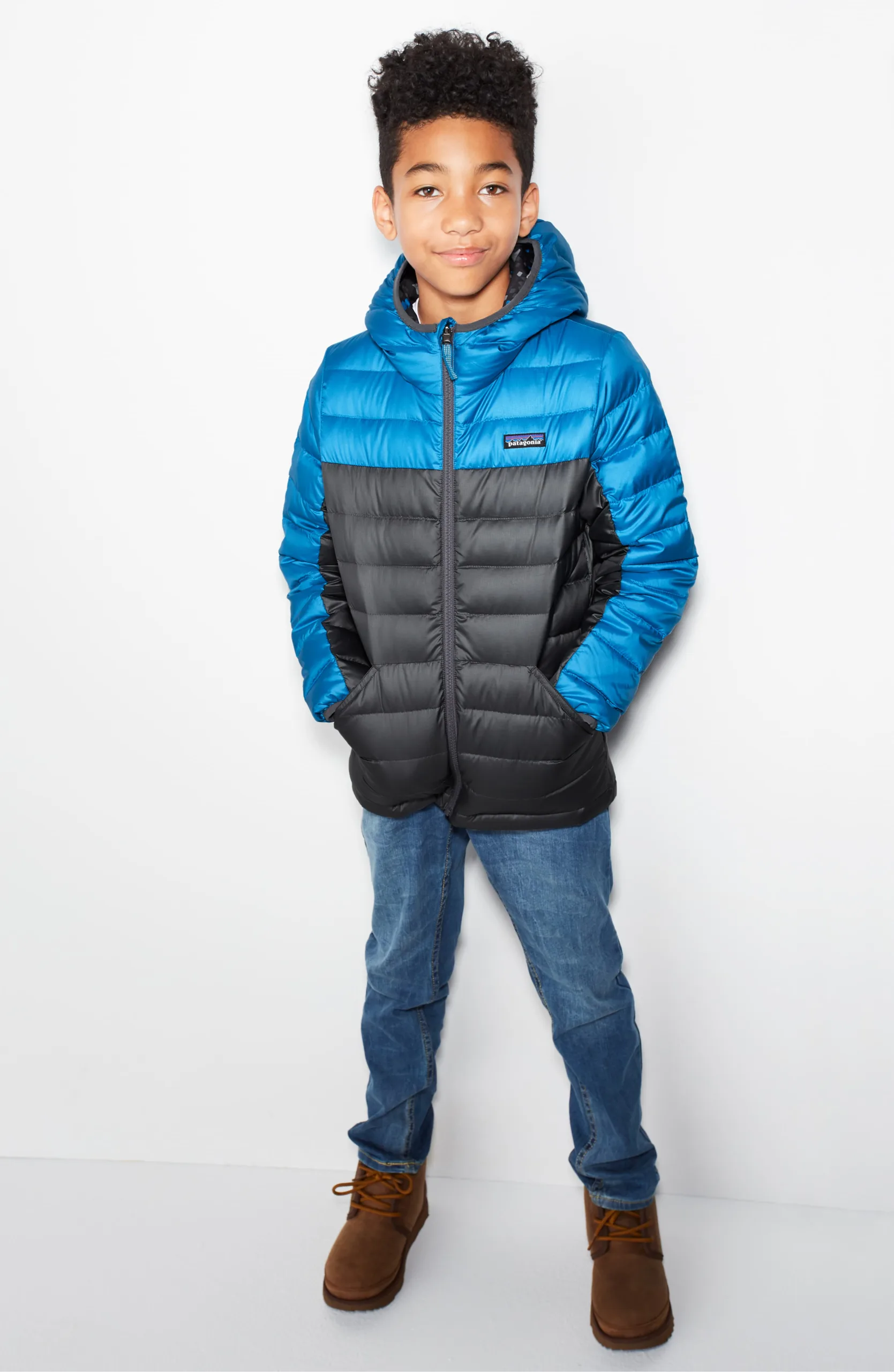 Patagonia Water Repellent Sweater Hoodie Jacket for kids is reversible, practical, and built to last