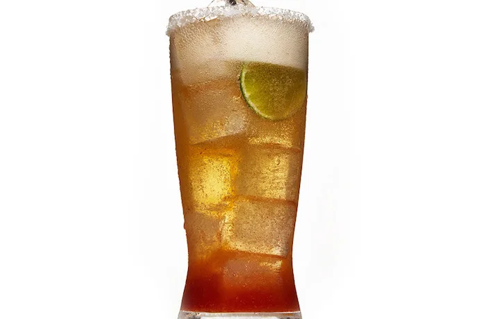 Sriracha-Lada beer cocktail from Bon Appetit. All the kick of a Bloody Mary and then some.